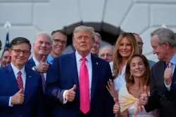 Just 1 in 4 US adults say Trump’s policies have helped them, a new AP-NORC poll finds