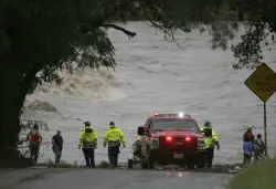 At least 24 dead in extreme Texas flooding. Several people remain missing